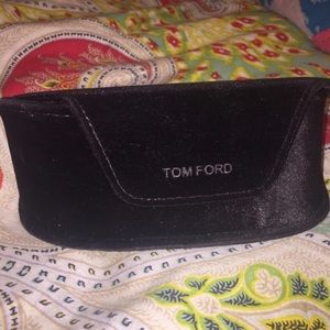 Oversized Tom Ford sunglasses case.
